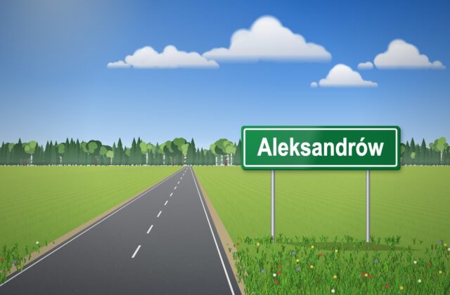 Illustration: green sign reading “Aleksandrów” on the verge of a country road, with a field, forest and a cloudy sky in the background